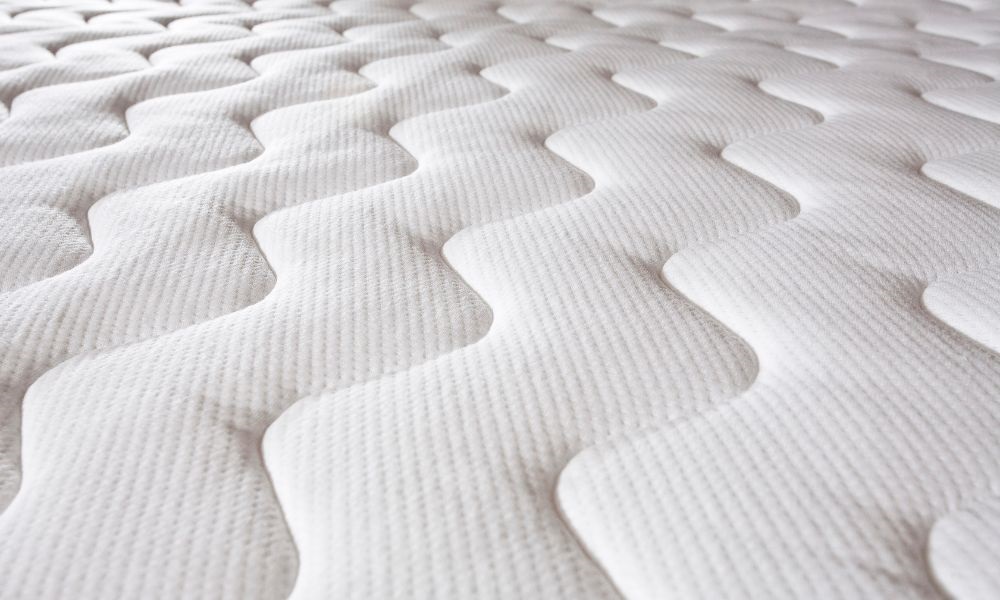 Mattress with wavy design surface
